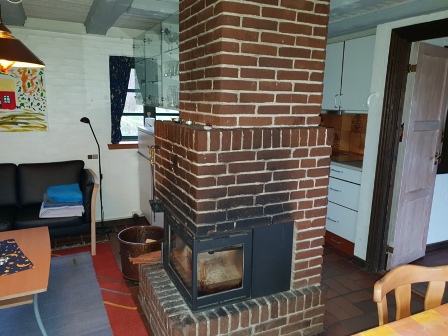 Wohnzimmer Ledercouchecke und Kamin