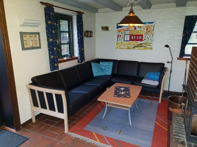 Wohnzimmer Ledercouchecke und Kamin